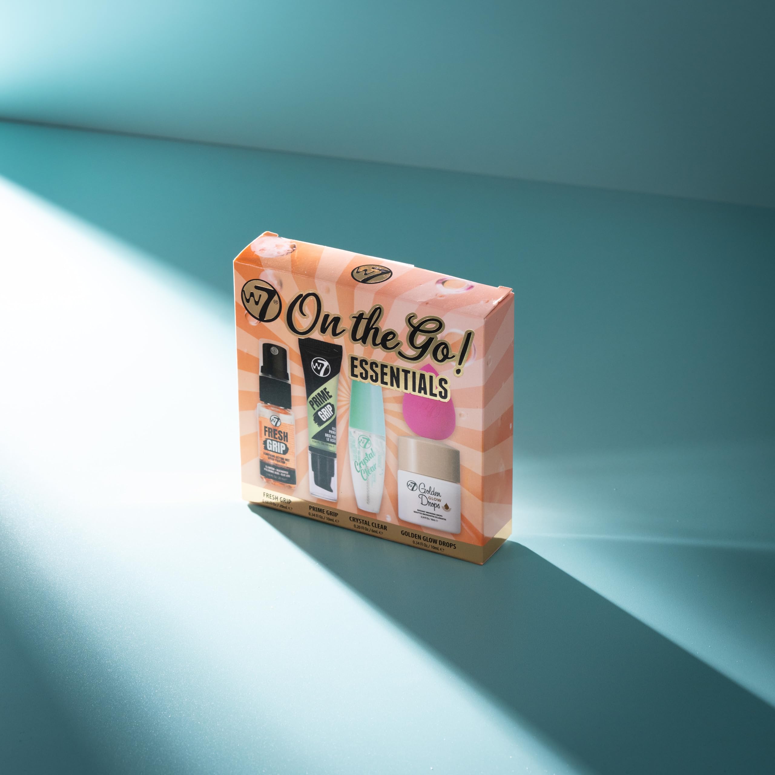 W7 On the Go Essentials - Mini Makeup Must-Haves with Primer, Setting Spray, Mascara, Golden Glow Bronzing Drops & Beauty Sponge - Travel or Handbag Size Essentials