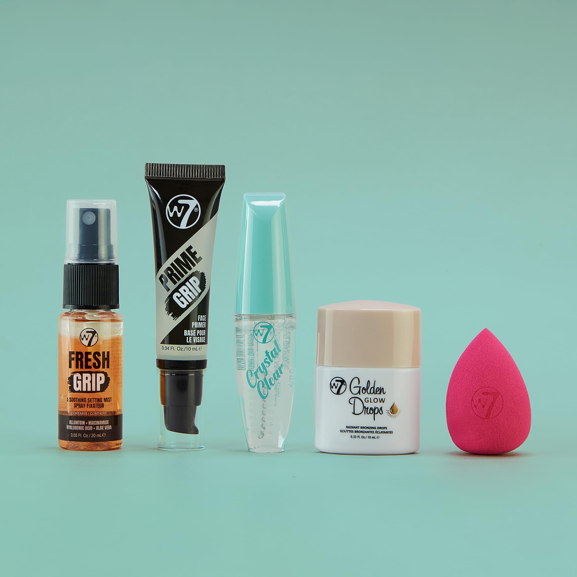 W7 On the Go Essentials - Mini Makeup Must-Haves with Primer, Setting Spray, Mascara, Golden Glow Bronzing Drops & Beauty Sponge - Travel or Handbag Size Essentials